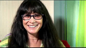 Mature sweetheart discussing taboo topics while pleasuring herself